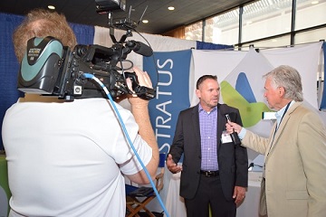 Dr. Dale Alverson interviews a vendor during the Ligntning Rounds at the SPS 2016. 