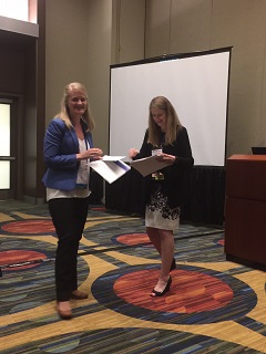 Ashley Anne Lowe is awarded a travel scholarship at the American Thoracic Society conference last month in San Francisco.