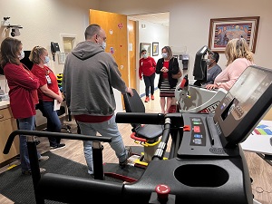 Benson Hospital staff and visitors gather to help celebrate the new cardiac telemedicine rehabilitation room.