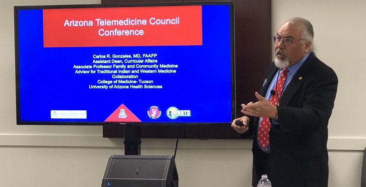 Carlos Gonzales, MD, Director the Rural Health Professions Program, briefs the Arizona Telemedicine Council on the success of those programs