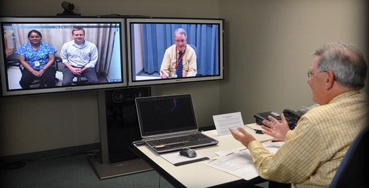 Dr. Bruce Coull taking part in a mock consultation.