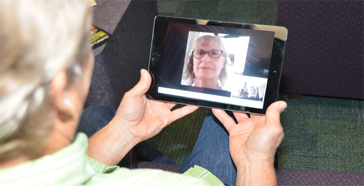 Dr. Shea consults with a remote hospice patient via telemedicine.