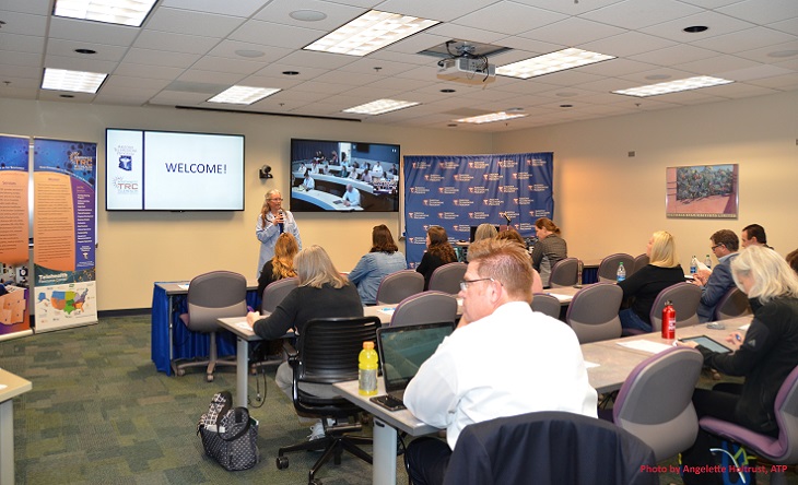 Melanie Esher-Blair welcoming local training program participants in Tucson as well as remote participants at our Phoenix video conference classroom.