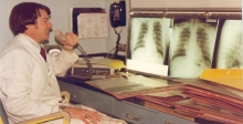 A young version of the author at the view box looking at chest “films” (chest radiographs), circa 1975.
