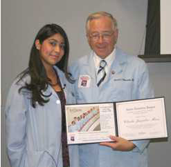 A High School Osler Fellow with Dr. Weinstein at graduation